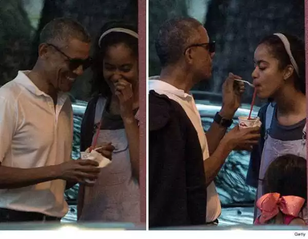 Adorable photo of Barack Obama feeding his daughter Malia